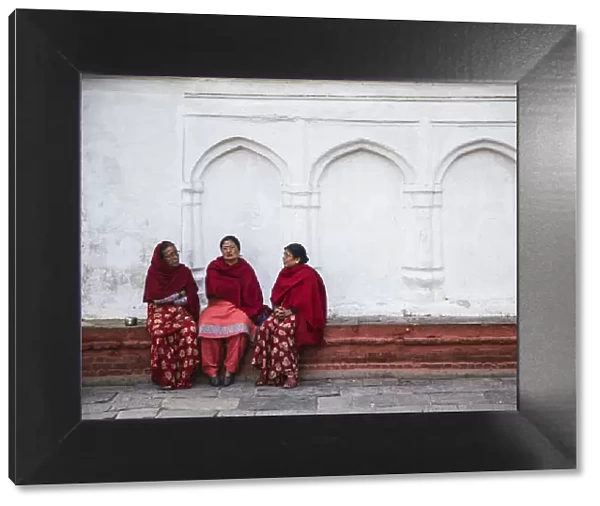 Women sitting in Durbar Square (UNESCO World Heritage Site), Kathmandu, Nepal