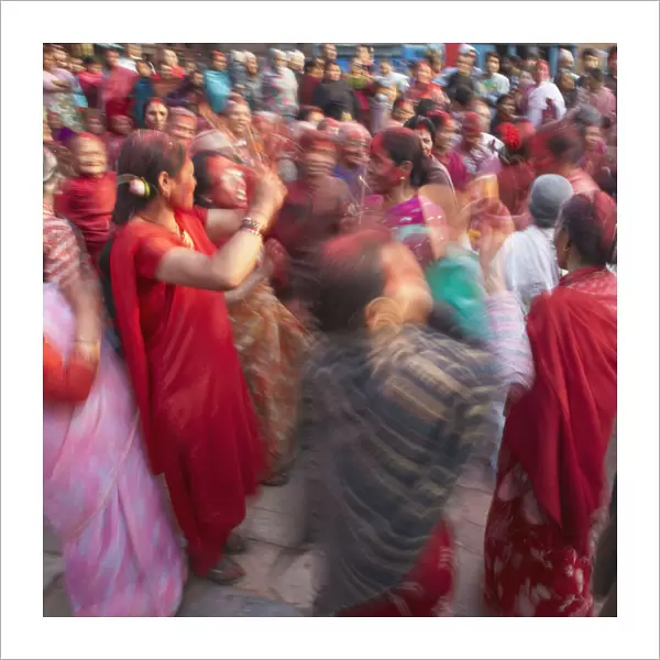Nepalese women celebrating Holi festival, Bhaktapur (UNESCO World Heritage Site)