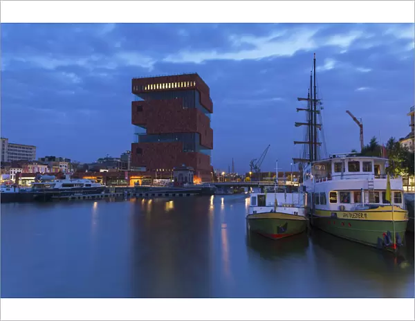 Museum aan de Stroom (MAS) in Willem Dock Marina at dusk, Antwerp, Flanders, Belgium