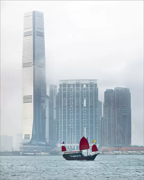 International Commerce Centre and Chinese junk boat in West-Kowloon, Hong Kong, China