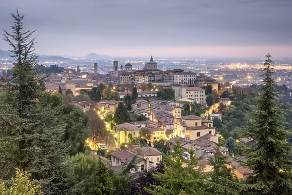 Cloudy sunrise at upper city of Bergamo, Lombardy, Italy