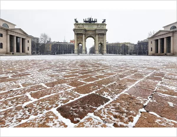 Arch of Peace after a snowfall. Milan, Lombardy, Northern Italy, Italy