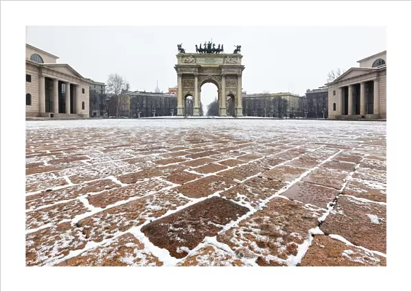 Arch of Peace after a snowfall. Milan, Lombardy, Northern Italy, Italy
