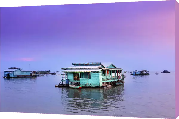 Southeast Asia, Cambodia, floating houses on Tonle Sap lake at sunset