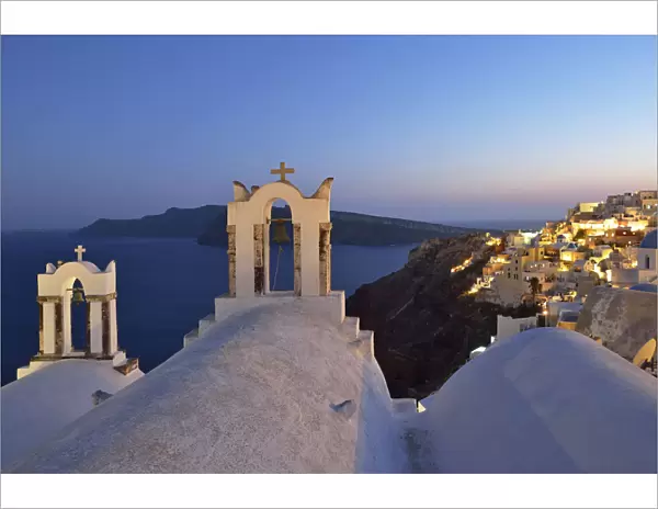 Church and town of Oia at dusk, Santorini, Kyclades, South Aegean, Greece, Europe