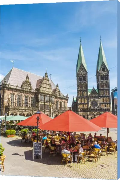 Bremen, Bremen State, Germany. People eating out in Marktplatz in front of the Town Hall