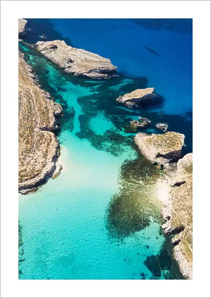 Malta, Gozo Region, Comino. Aerial view of the azure coloured waters of the Blue Lagoon
