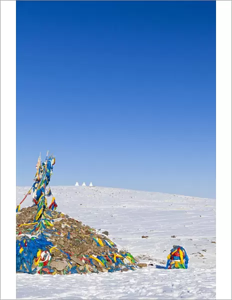 Mongolia, Ovorkhangai. An Ovoo, which is a type of sacred Buddhist cairn, by the roadside
