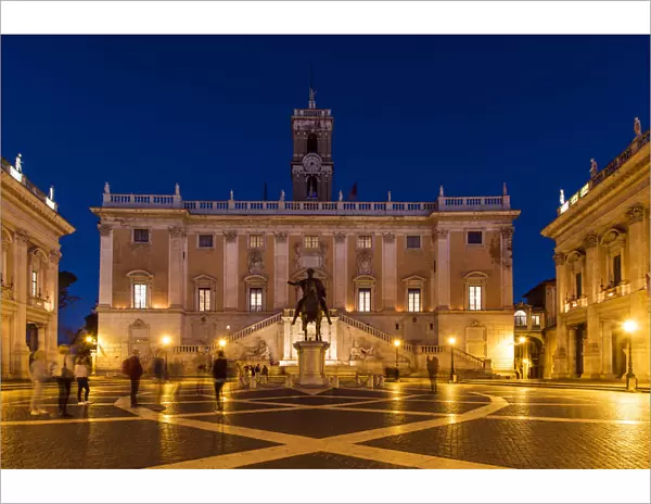 Night view of Piazza del Campidoglio with Palazzo Senatorio and the replica of the