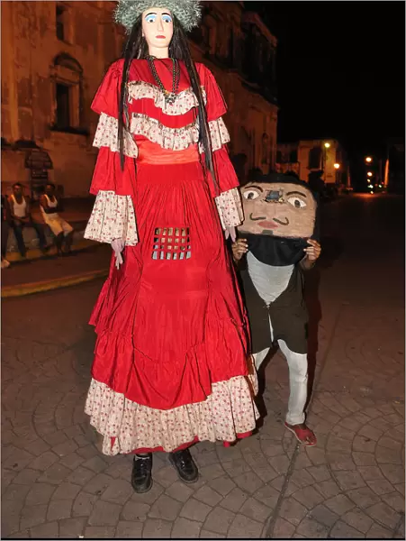 Kids with big puppet, Leon, Nicaragua, Central America