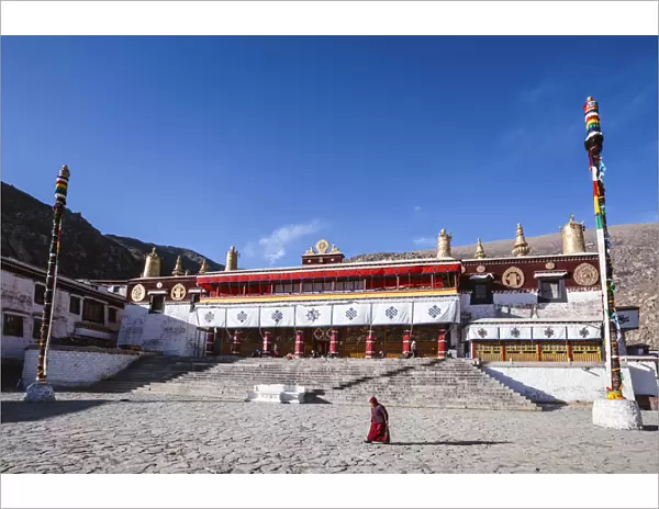 Monk in front of Drepung monastery, Lhasa, Tibet, China