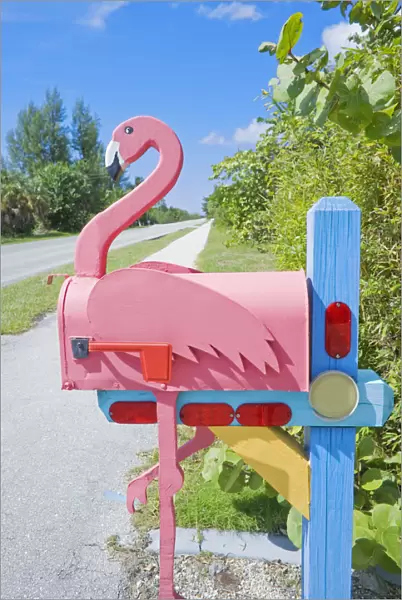 Flamingo made of wood attached to mailbox, Sanibel Island, Florida, USA
