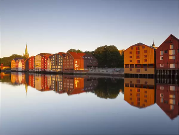 Nidaros Cathedral & Gamle Bybro illuminated at sunrise, Trondheim, Sor-Trondelag, Norway