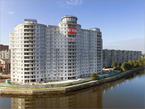 Russia, Kaliningrad, modern apartment building along the Pregolya river