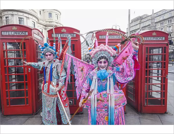 England, London, Soho, Chinatown, Chinese New Year Festival Parade, Couple Dressed