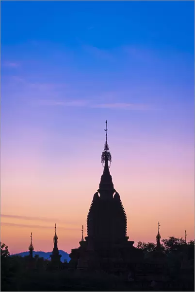 Silhouette of old pagoda against purple sky during sunrise, Bagan, Mandalay Region