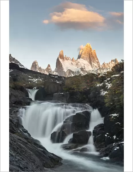 Secret waterfall and Fitz Roy at sunrise, El Chalten, Santa Cruz province, Argentina