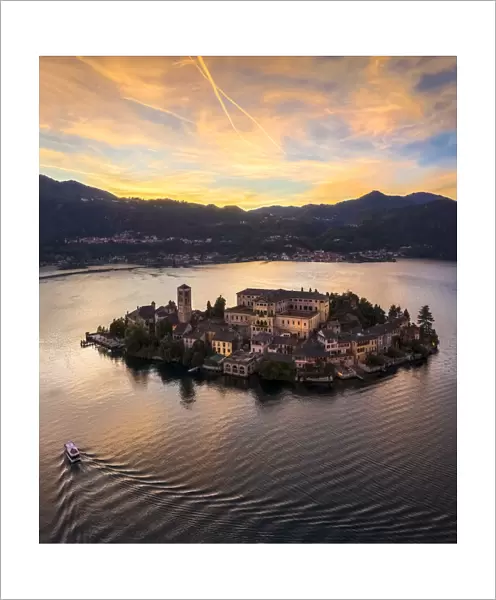 Aerial view of Orta San Giulio and Lake Orta at sunset. Orta Lake, Province of Novara