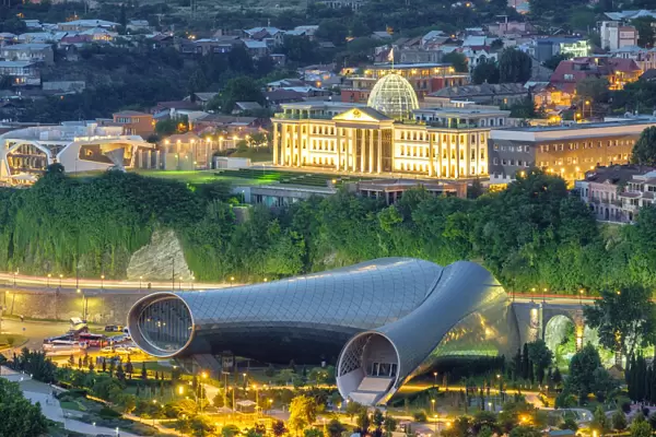 Concert Hall & Exhibition Center in Rike Park and Presidential Palace at night