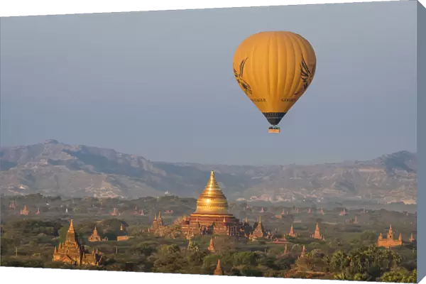 A hot air balloon flying over Dhammayazika temple, UNESCO, Pwasaw, Old Bagan