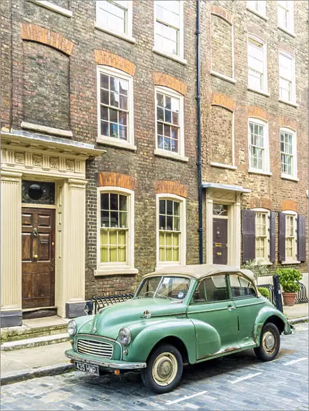Morris Minor car and 18th Century Georgian town houses, Shoreditch, London, England, Uk