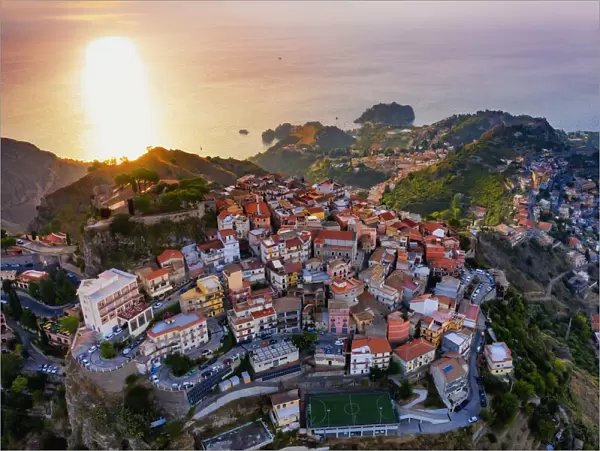 Taormina, Sicily. Aerial view of Taormina and Castelmola village at sunrise