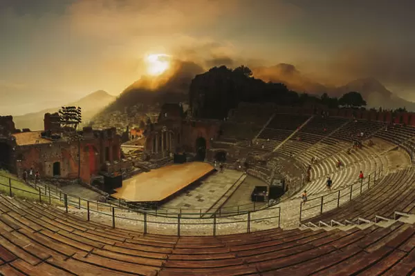 Taormina, Sicily. Panoramic view of the greek theater with Etna volcano in the background
