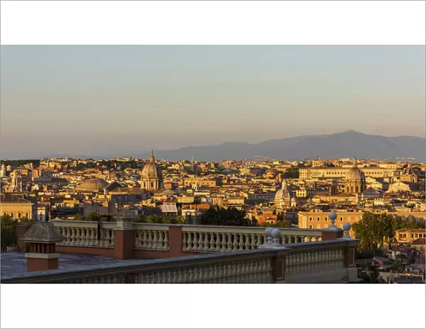 europe, Italy, Latium. Rome, the city at sunset seen from a terrace above Trastevere near