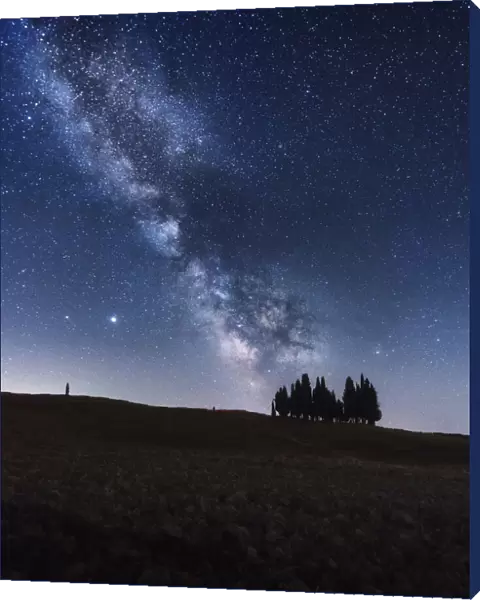 Night sky and Milky Wayy over rural Tuscany, Italy