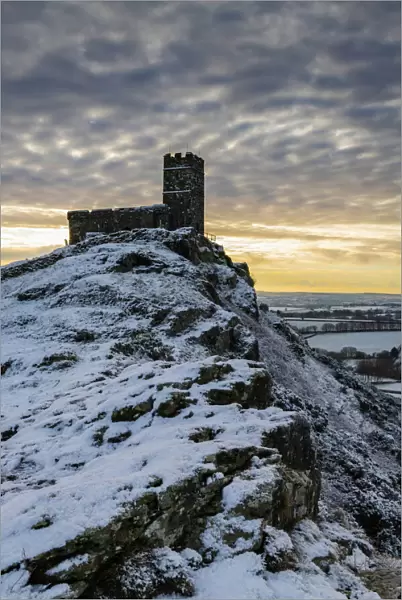 Brentor Church on a snowy outcrop on a winter morning, Dartmoor, Devon, England