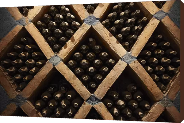 Vintage wine bottles in the cave of the Bodega 'Las Arcas de Tolombon' winery, Colalao del Valle, Calchaqui Valleys, Tucuman, Argentina