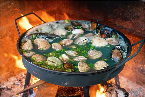 Chilean dish named mariscos al disco on open fire, Valparaiso, Valparaiso Province, Valparaiso Region, Chile