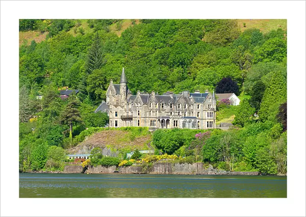 Loch Awe Hotel on shore of Loch Awe on sunny day, Argyll And Bute, Scotland, UK