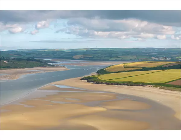 The Doom Bar is revealed at low tide in the Camel Estuary near Padstow, Cornwall, England. Summer (June) 2023