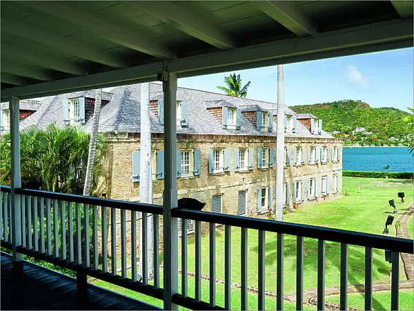Historic buildings view from a colonial style veranda, Nelson's Dockyard, English Harbour, Antigua, Caribbean, West Indies