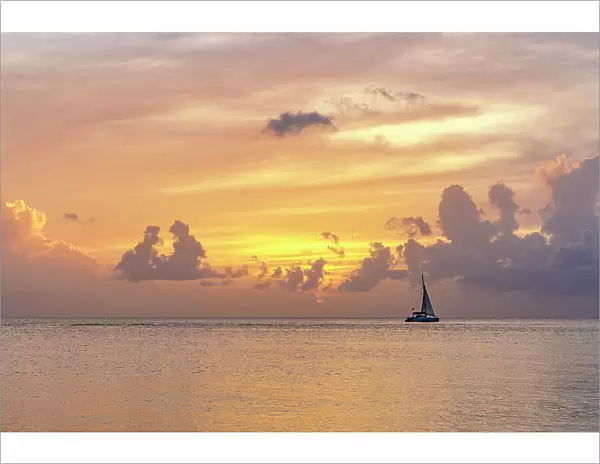 A lone boat sailing in the Caribbean Sea, Antigua, Antigua & Barbuda, Caribbean, West Indies