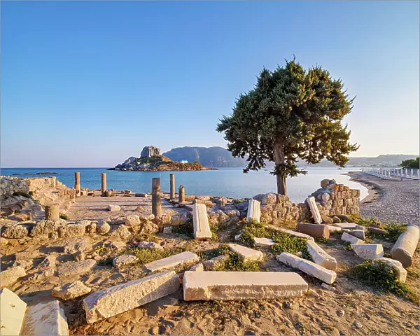 St. Stefanos Basilica Ruins and Kastri Island at sunset, Agios Stefanos Beach, Kos Island, Dodecanese, Greece