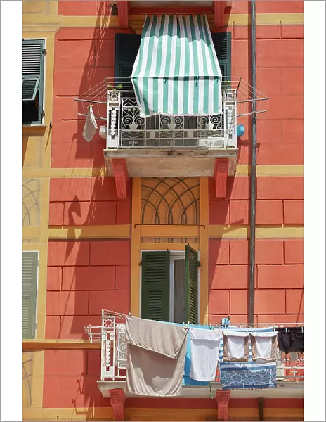 Clothes line on a balcony of a building in the historical cask of Lerici, La Spezia, Liguria, Italy