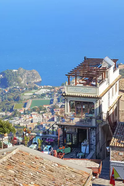 View of Taormina and the Ionian coast from Castelmola main square, Castelmola, Taormina, Sicily, Italy