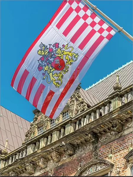 Bremen flag on the historic town hall on the market square, Bremen, Germany
