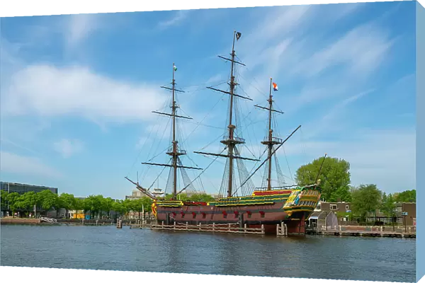 Replica of The Amsterdam moored in river against sky, Community Marineterrein, Amsterdam, Netherlands