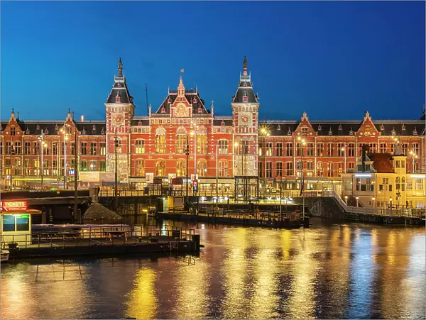 Amsterdam Centraal Station at twilight, Amsterdam, Netherlands