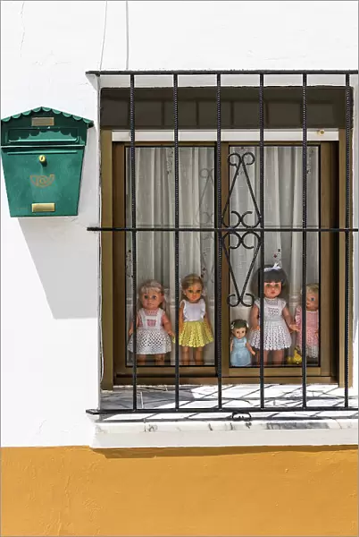 A window with dolls, Olivenza, Badajoz, Extremadura, Spain