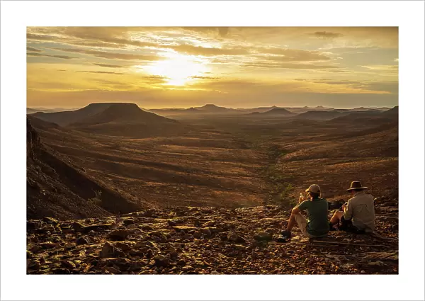 Africa, Namibia, Damaraland, Etendeka Plateau. A scenic sundowner setting