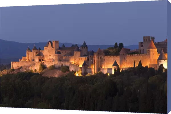 France, Languedoc-Rousillon, Carcassonne. The fortifications of Carcassonne at dusk