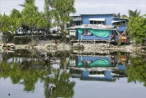 Floodwater inundates Funafuti atol Tuvalu due to global warming induced sea level rise
