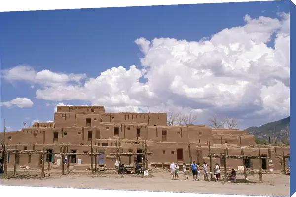 20065173. USA Colorado Taos Pueblo Inhabited historical dwellings with tourists outside