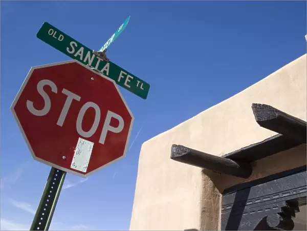 20075979. USA New Mexico Santa Fe Stop sign on the Old Santa Fe Trail beside
