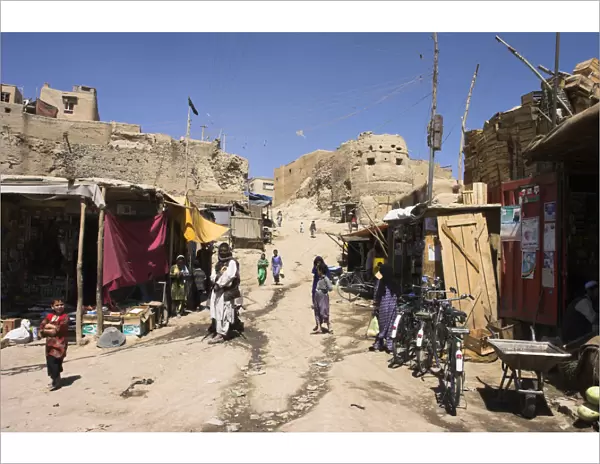 20085142. AFGHANISTAN Ghazni Street leading to ancient walls of Citadel