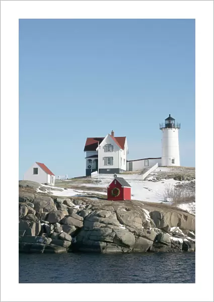 USA, Maine, York, Nubble Light lighthouse, Winter, Atlantic Ocean